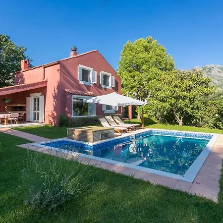 Stunning Red With A Pool Hotel